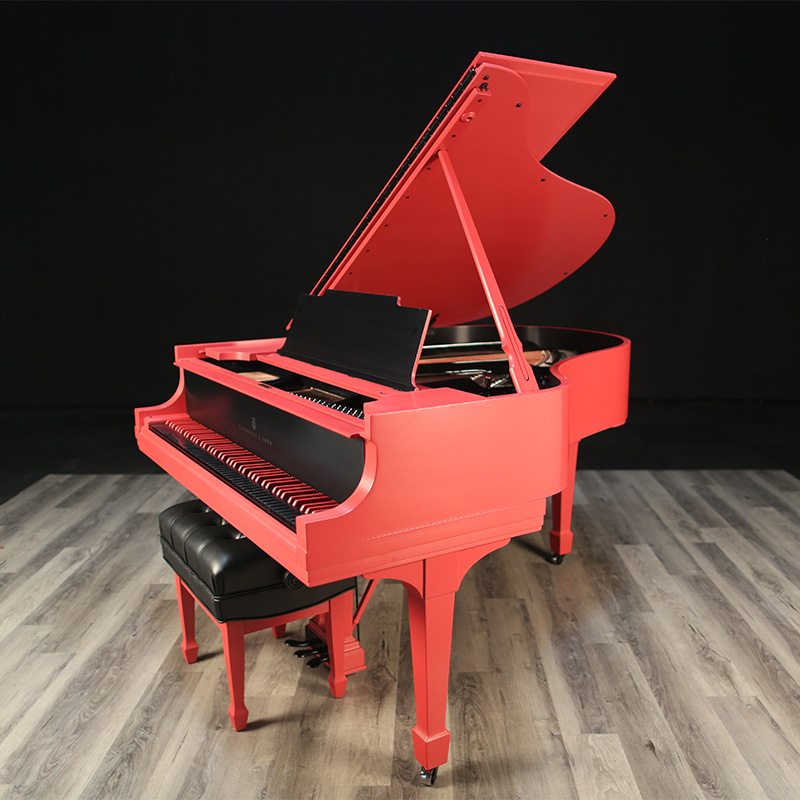 Coral red two-tone Steinway M with black interior